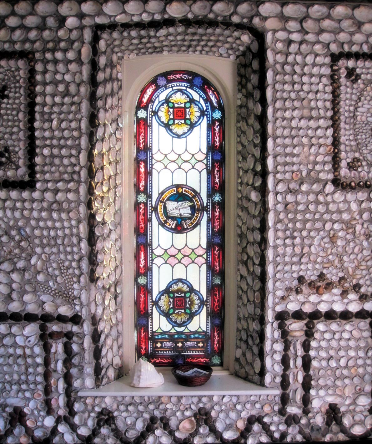 Detail view of a stained glass window in the Shell Chapel interior